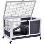 Grey and white lift-top hutch with wire roof lifted open, showing interior ramp