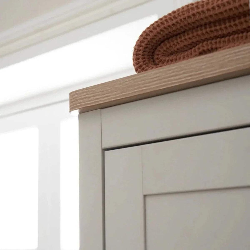 Oak top edge on white wardrobe