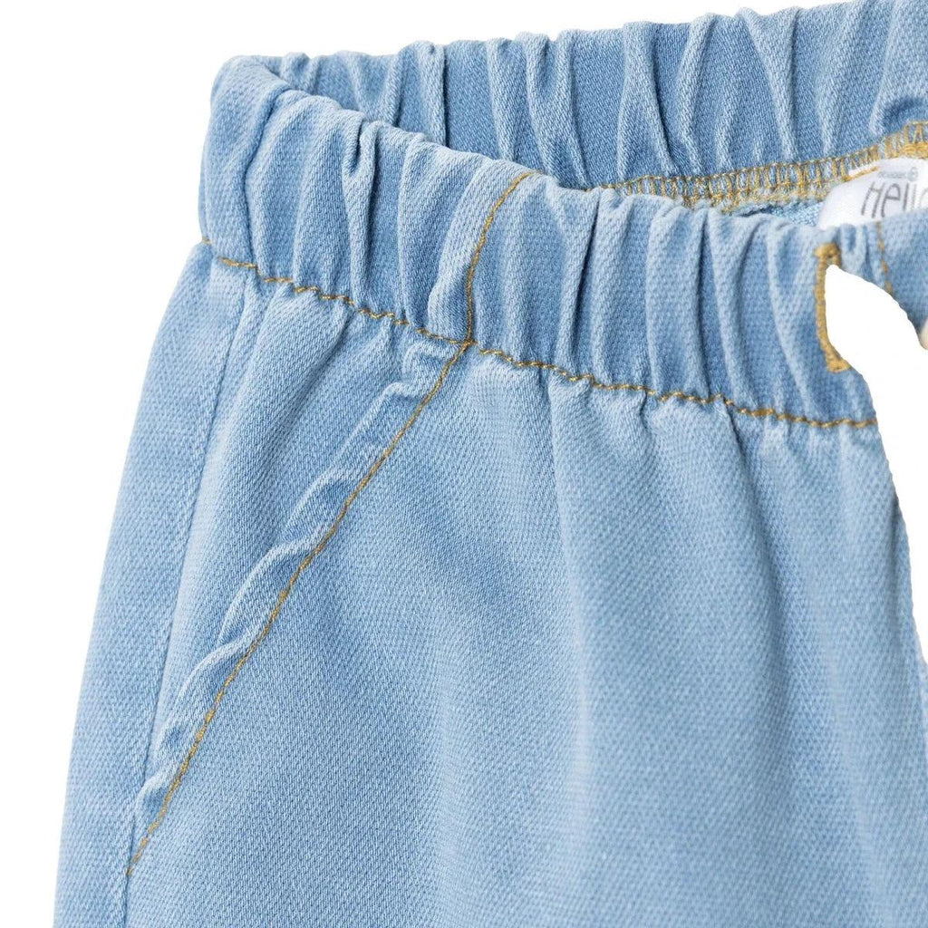Light blue denim baby trousers elastic waistband with stitched panel seams