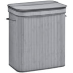 Grey fabric laundry basket with flip lid and side handles, removable liner.