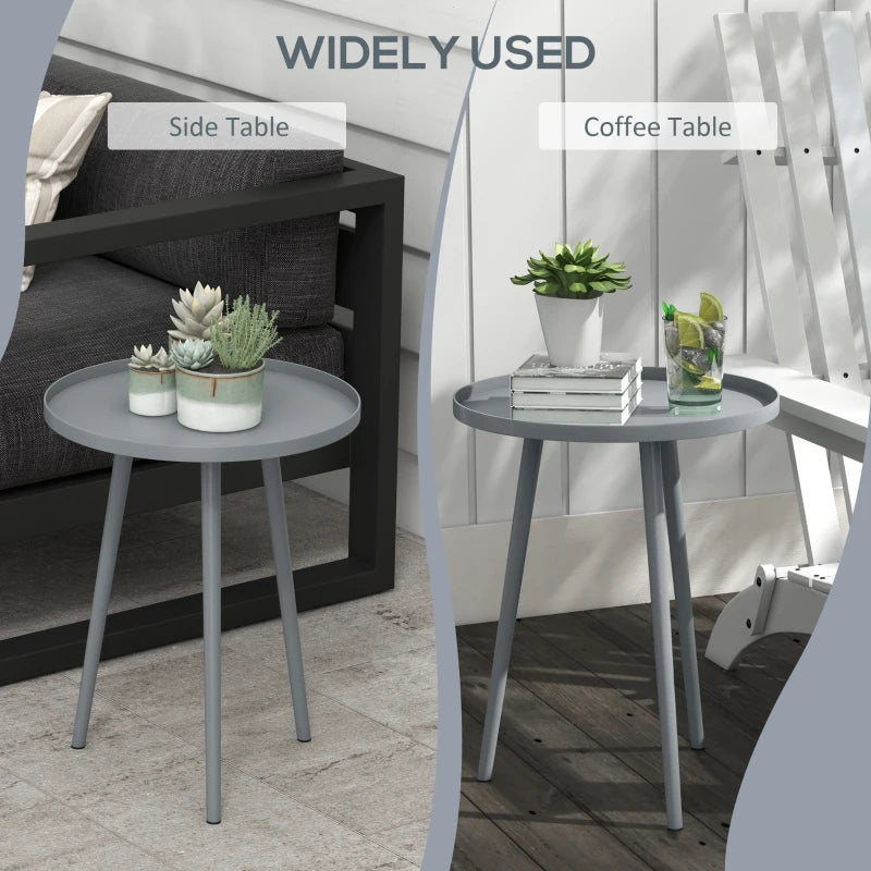 Grey round table with smooth edge, flat circular top, and tapered steel legs
