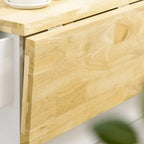 Light wood drop-leaf countertop edge on white rolling kitchen island
