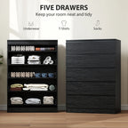 Black 5-drawer dresser with open top drawers showing folded clothing items.