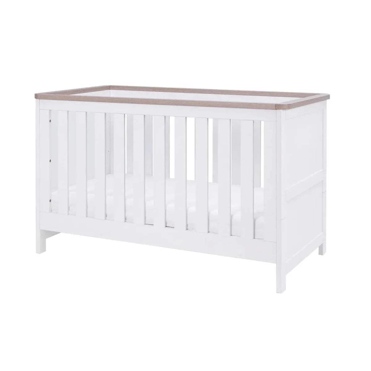 White baby cot with vertical slats and light wood top rail