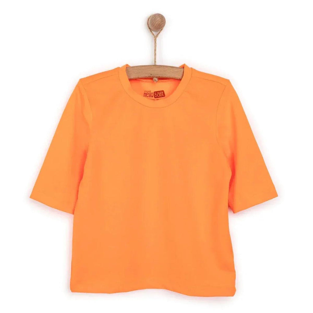 HelloBaby short sleeve baby swim top in neon orange, flat lay on hanger.