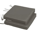 Stacked pair of dark grey square chair cushions with attached fabric tie strings