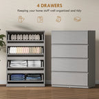 Grey dresser cabinet with four open drawers showing neatly organized items inside.