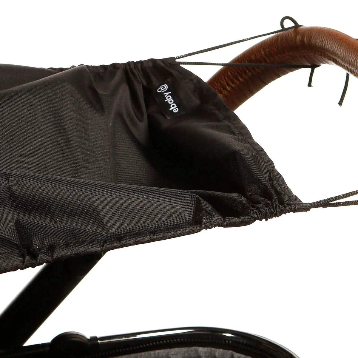 Black stroller sunshade canopy with hanging cord and small printed logo