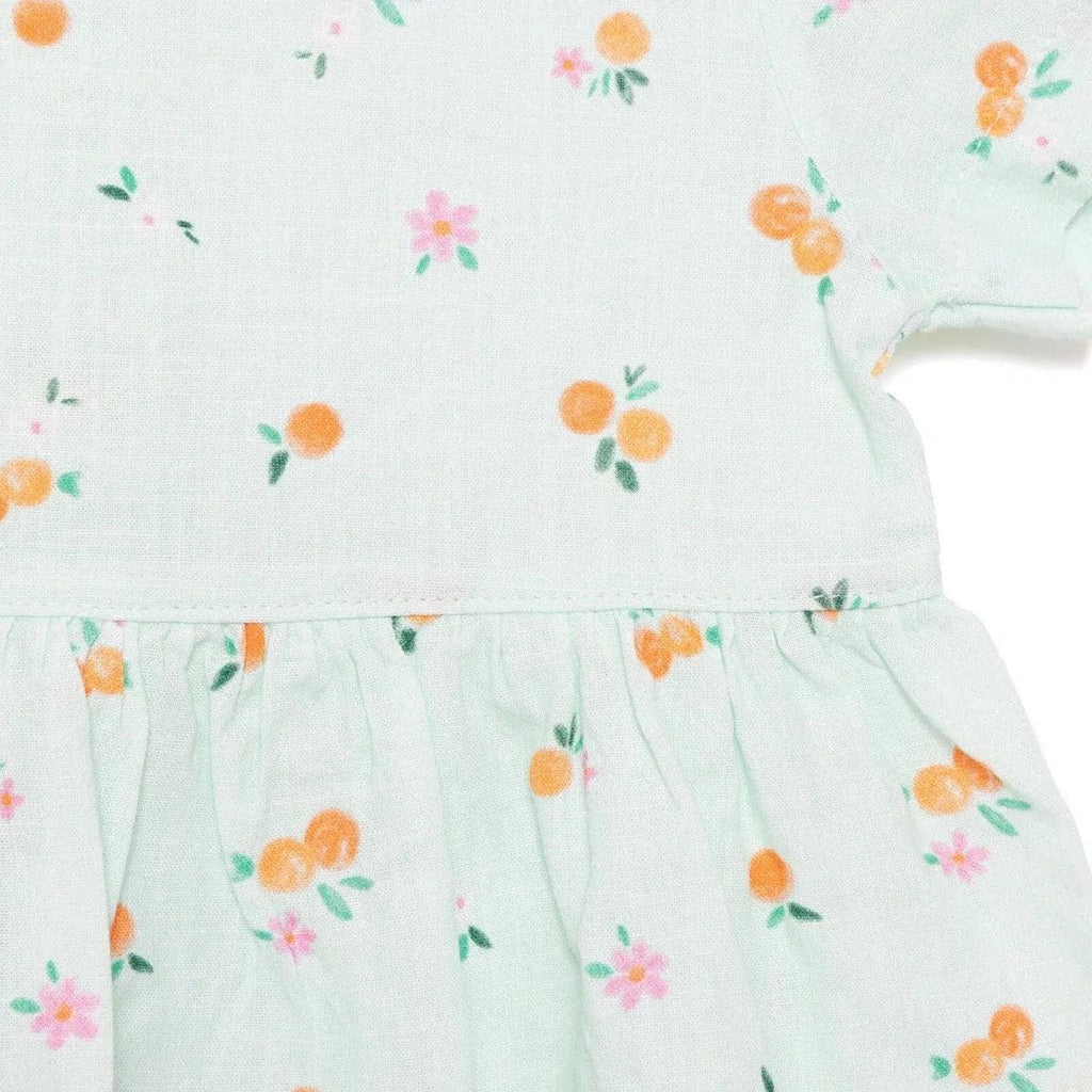 Light blue newborn woven dress with orange and pink floral print, gathered skirt seam