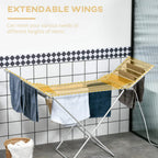Electric heated clothes dryer with extendable wings, silver frame, hanging garments