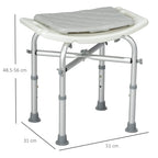 White height-adjustable shower seat with padded cushion, four legs, and shower head holder
