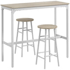 Industrial bar table with two light oak-tone stools and white metal frame.