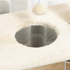 Cat tree plush tunnel opening on a round platform with dangling toy above