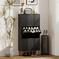 Black shoe cabinet with open shelves and gold handle, ready for shoes and accessories.