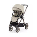 Buttermilk single pushchair stroller with beige hood and black wheels, front seat view