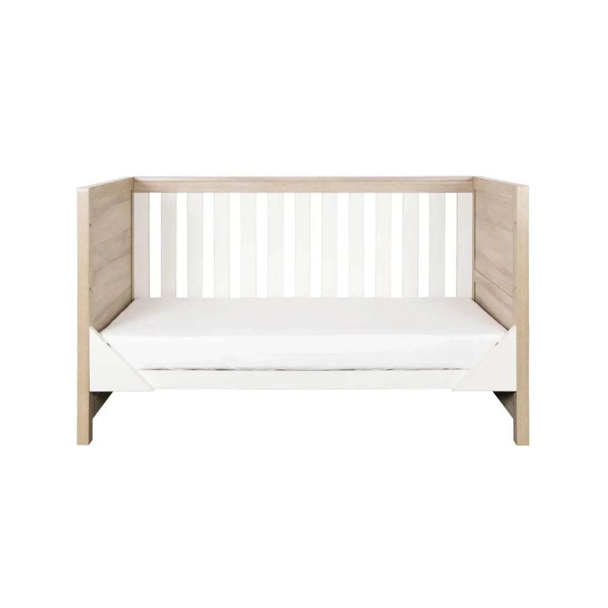 White and oak toddler daybed with vertical slats and side rails