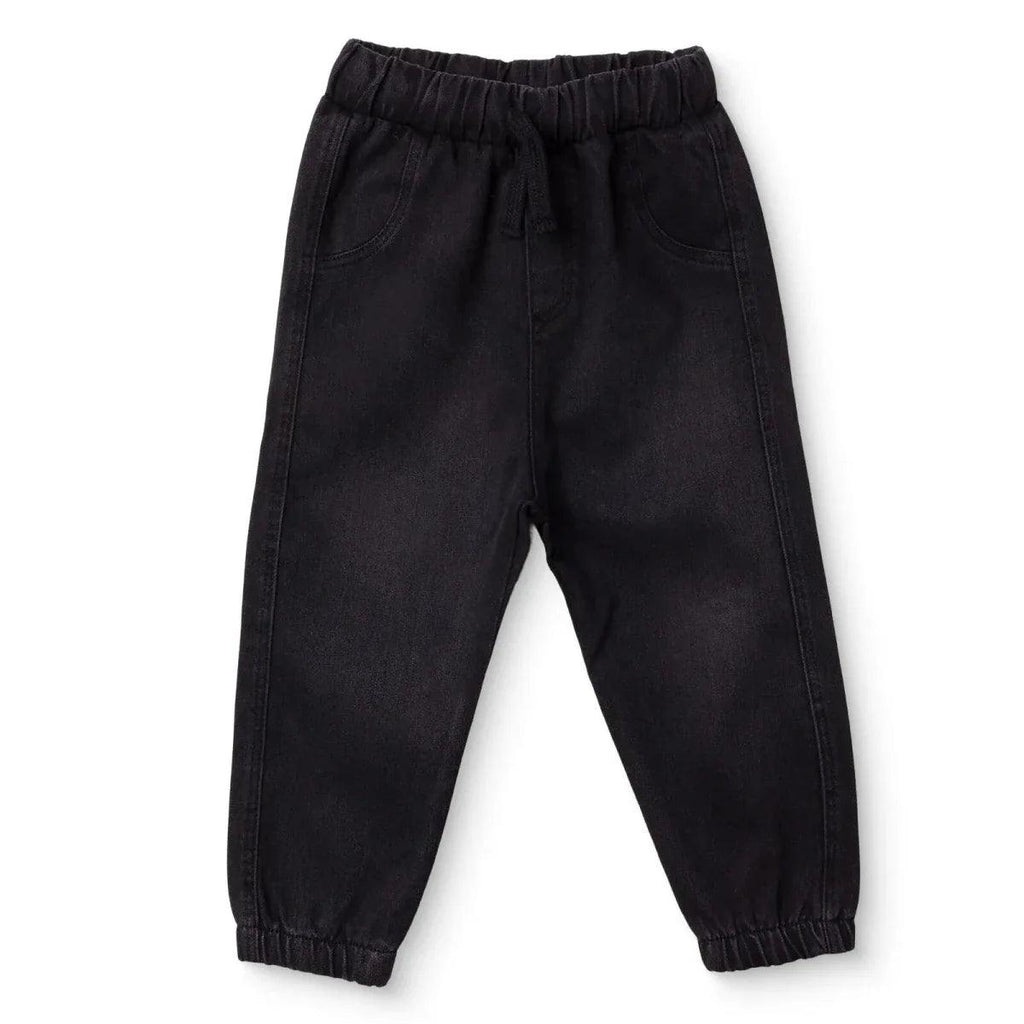 Black denim baby trousers with elastic waistband and tapered legs
