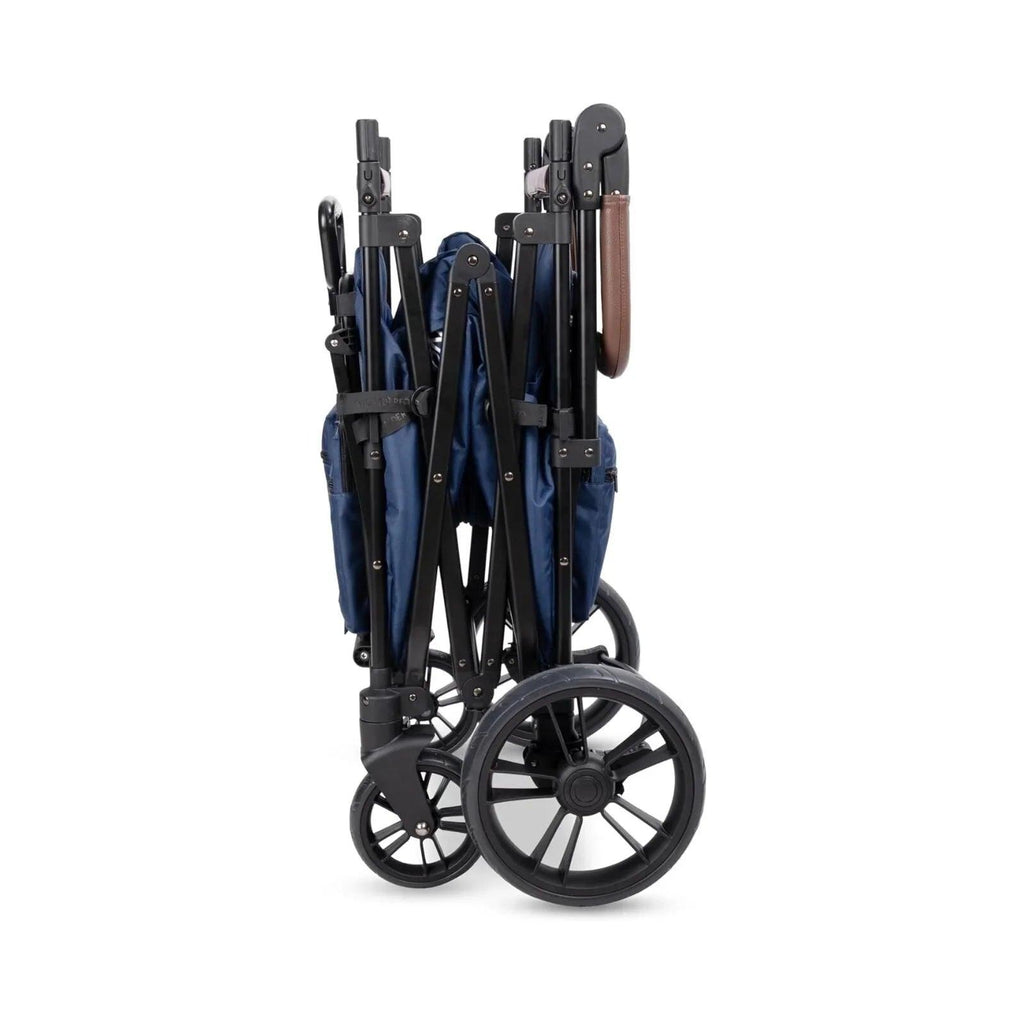 Sapphire navy stroller wagon folded side view with compact wheel layout