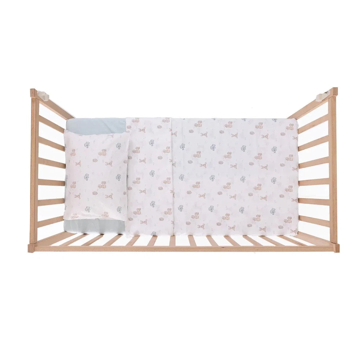 Duvet cover and pillowcase set featuring pale blue and beige animal print