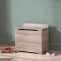 Oak wooden toy box with flip-top lid and front handhold slot