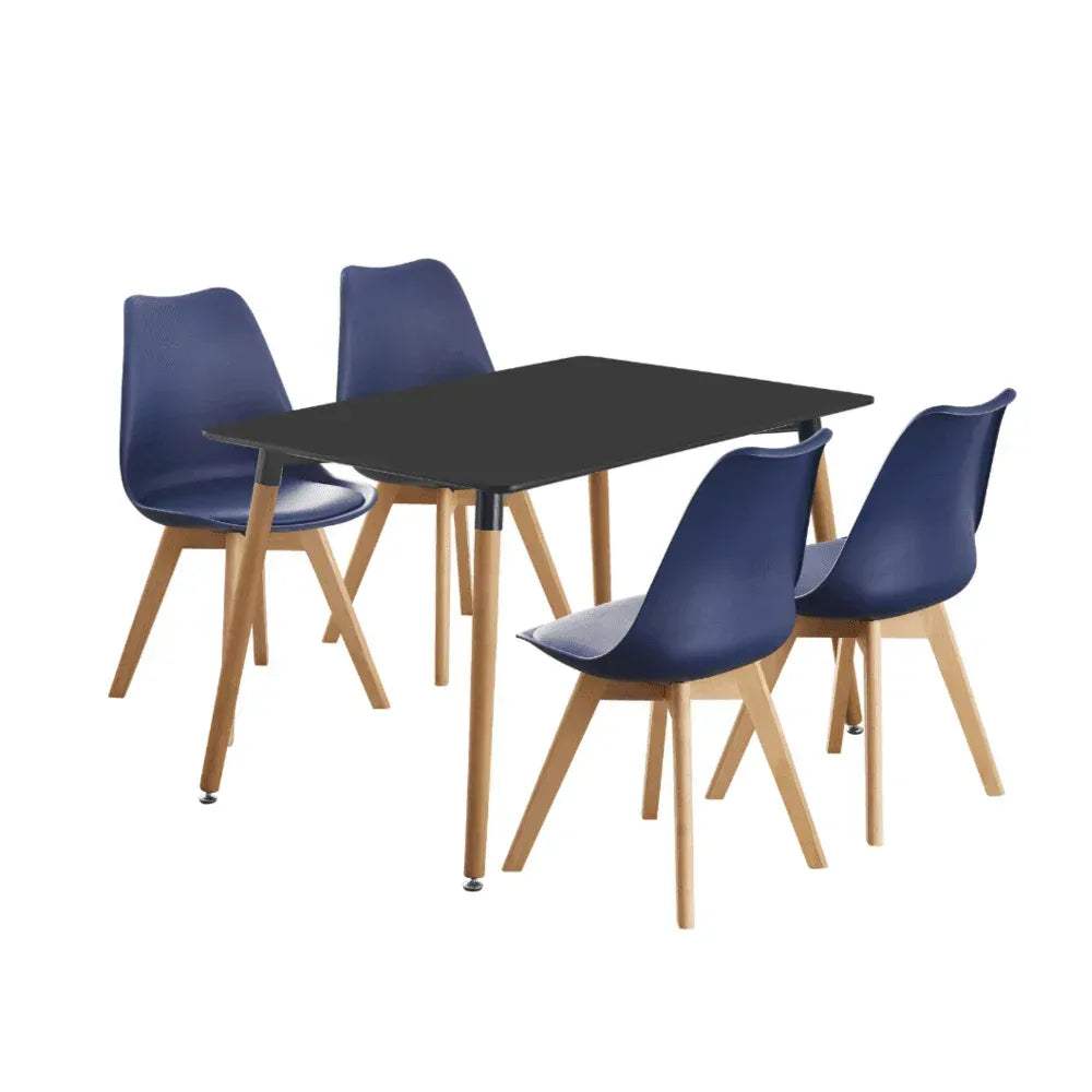 Dining table with black top and four navy tulip chairs with light-wood legs