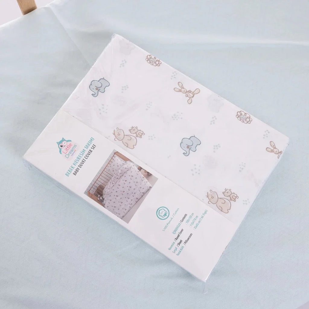 Duvet cover set packaging view showing light blue and beige animal print on white