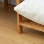 Bamboo rack leg and slatted shelf under a storage platform, natural wood