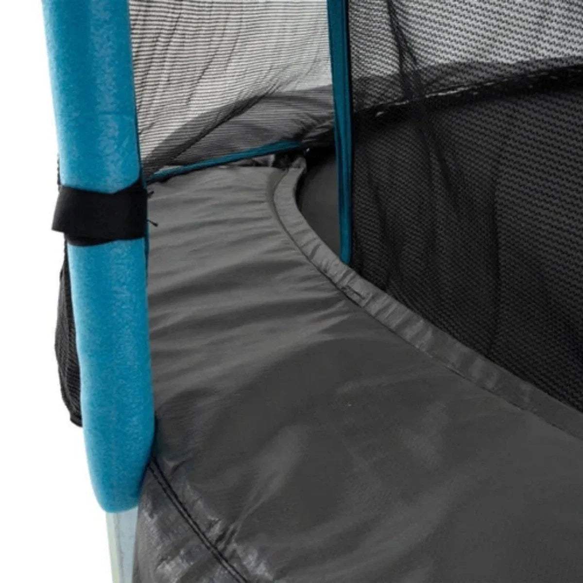 Trampoline enclosure with black mesh side and gray padded jumping mat edge