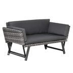 Grey 2-seater rattan sofa with dark cushions and rectangular armrests