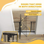 Black pet gate safety barrier with hinged door that auto-closes after opening