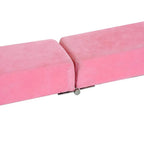 Pink foam balance beam corner with stitched padding and protective end cap.