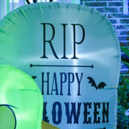 Green inflatable tombstone with RIP and Happy Halloween lettering and LED glow