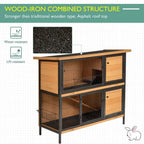 Wood-and-iron pet hutch with wire mesh windows and multiple wooden door panels