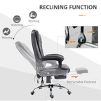 Dark grey recliner office chair at a reclined angle with retractable footrest and swivel base