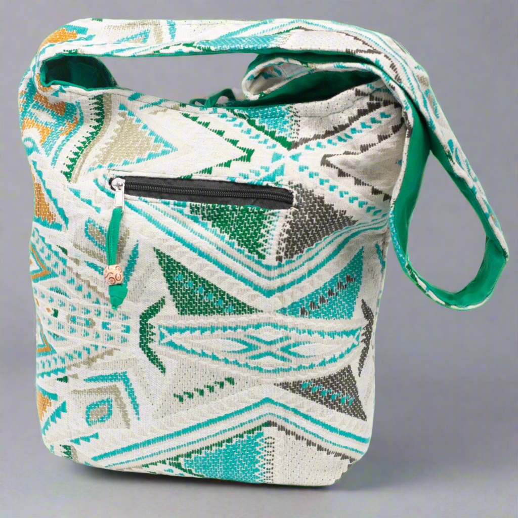 Patterned bag with a strap on a white background