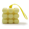 Peach & lemon massage soap in flower shape with yellow ribbon loop, pale yellow