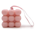 Pink beaded massage soap bar with carry cord, shaped like a bear