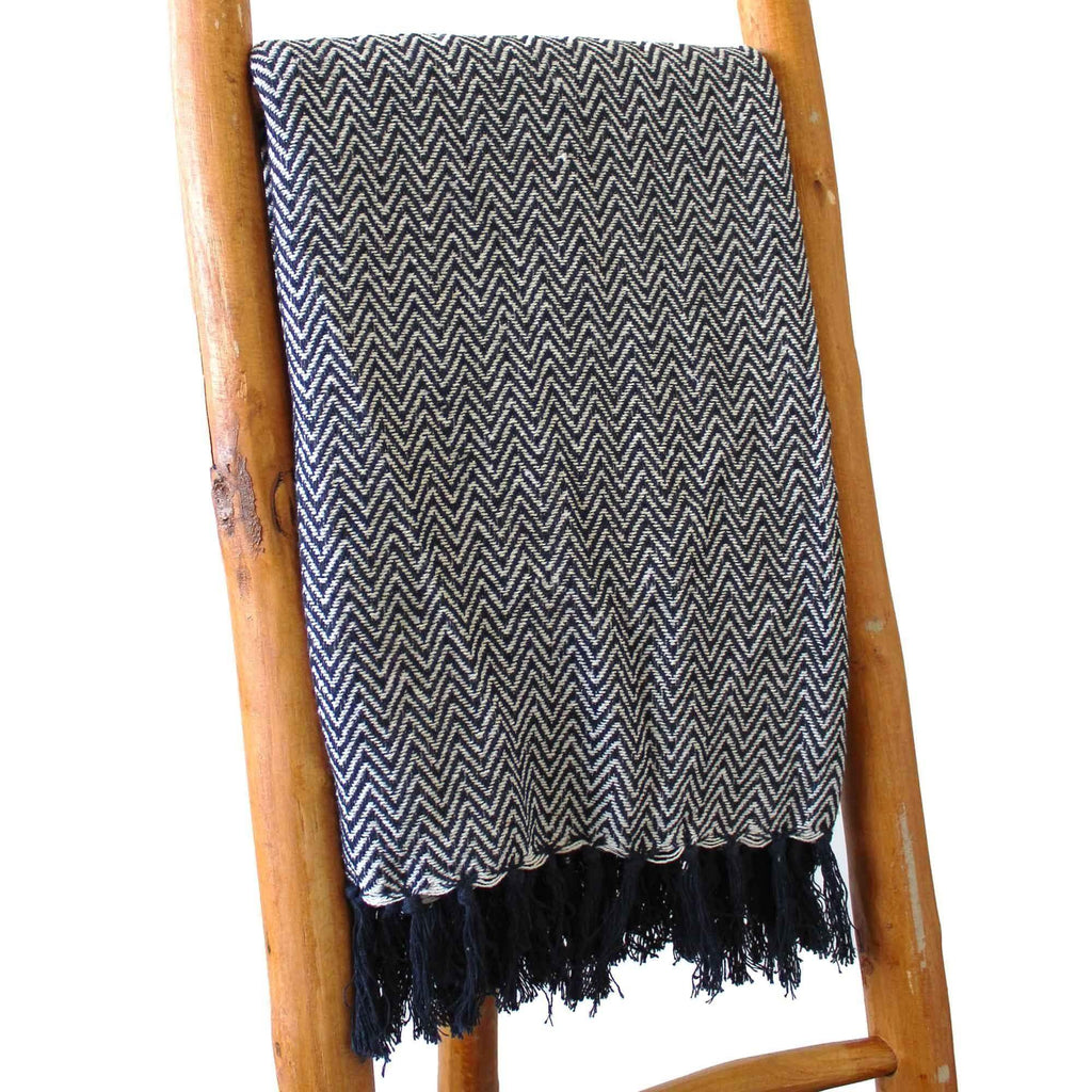Navy zigzag throw blanket with black tassel fringe edge