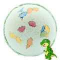 Green round bath bomb with multicolor dinosaur shapes on top