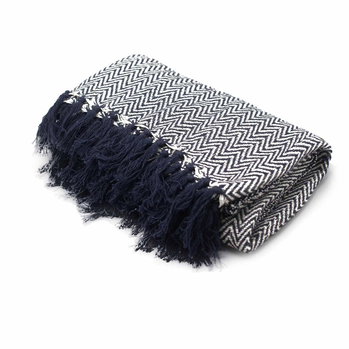 Folded chevron throw blanket with navy tassel fringe and zigzag weave