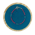 Beaded bracelet with pink and turquoise beads, silver clasp and extender ring