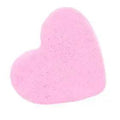 Pink heart-shaped bath bomb with smooth, textured surface