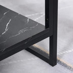 Close-up of black metal side frame and faux marble tabletop edge on two-tier coffee table