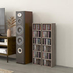 Two dark wood-effect CD storage units with open cubbies filled with CDs.