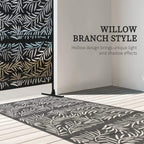 Black metal privacy screen panel with willow-branch leaf cutouts