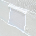 Roll-up window panel detail on a white mesh greenhouse cover