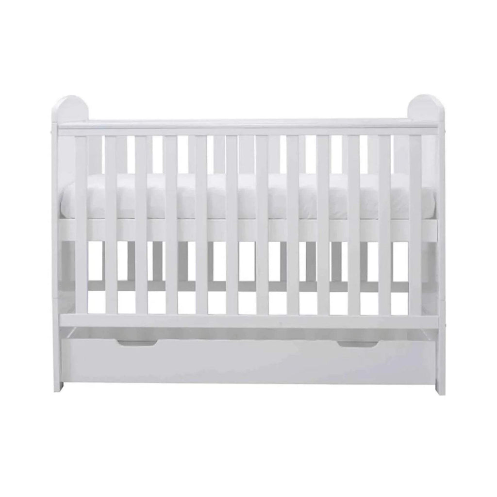 White mini cot bed end view with under-drawer panel below rails