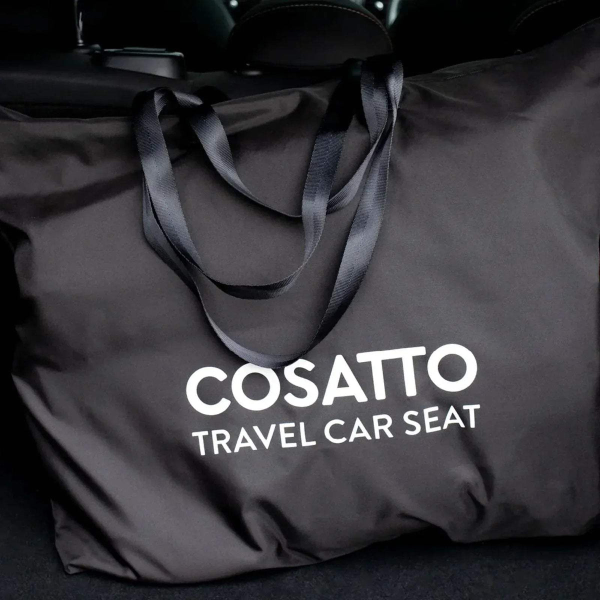 Black travel car seat carry bag with COSATTO Travel Car Seat printed