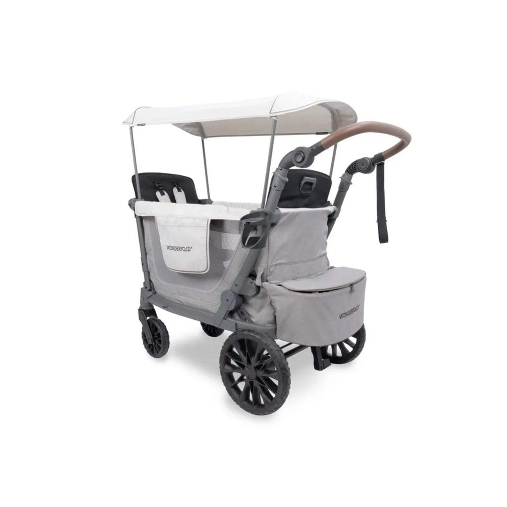 Grey stroller wagon angled view with canopy, front pocket panel, and large wheels.