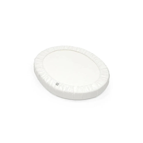 White fitted oval bassinet sheet with elastic edge